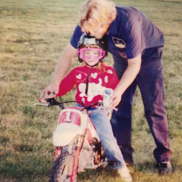 Photo of my dad teaching me to ride at age 4 on a PW-50